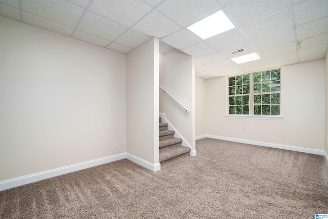 1819 Calgary Dr, Birmingham, AL 35022 - below grade area featuring carpet, a paneled ceiling, and stairway
