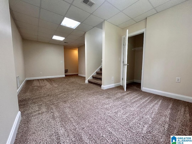 1819 Calgary Dr, Birmingham, AL 35022 - below grade area with a paneled ceiling, carpet, and stairs