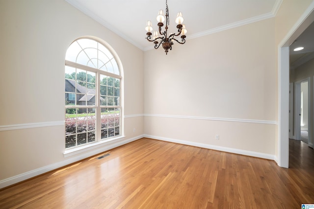 1819 Calgary Dr, Birmingham, AL 35022 - empty room with crown molding, a chandelier, and wood finished floors