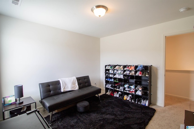 6497 Newbridge Dr, Bessemer, AL 35022 - living area with carpet flooring and baseboards