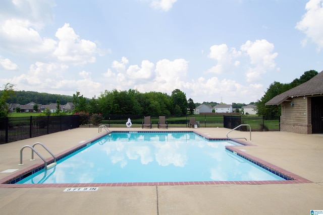 6497 Newbridge Dr, Bessemer, AL 35022 - community pool featuring a patio