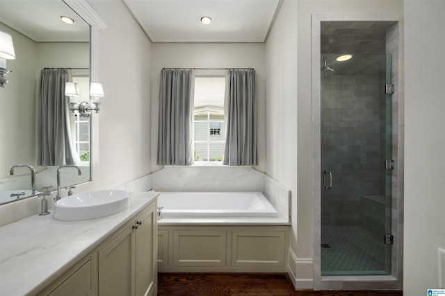 3600 Park Ln S, Mountain Brook, AL 35213 - bathroom featuring vanity, a stall shower, a bath, and wood finished floors