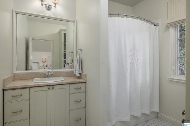 3600 Park Ln S, Mountain Brook, AL 35213 - bathroom featuring vanity, tile patterned floors, and shower / tub combo