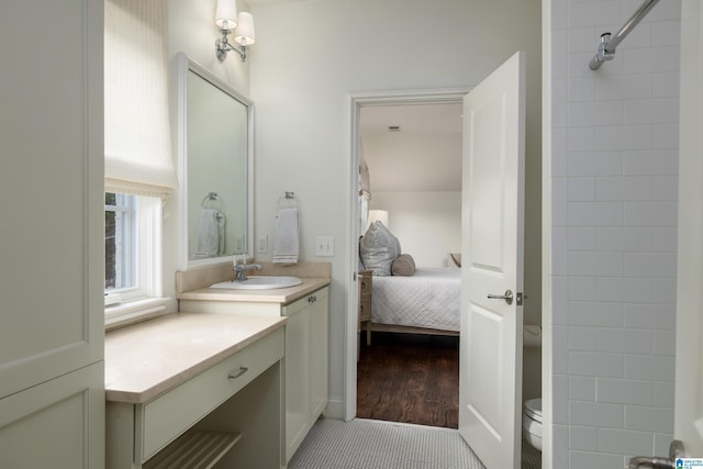 3600 Park Ln S, Mountain Brook, AL 35213 - bathroom with vanity, connected bathroom, a shower, and wood finished floors