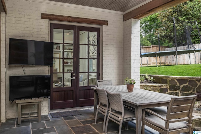 3600 Park Ln S, Mountain Brook, AL 35213 - view of patio with french doors and outdoor dining area
