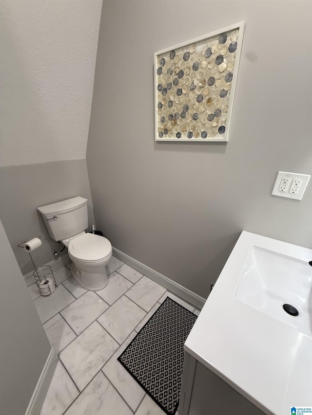 1926 County Road 621 S, Woodland, AL 36280 - bathroom with marble look tile flooring and vanity