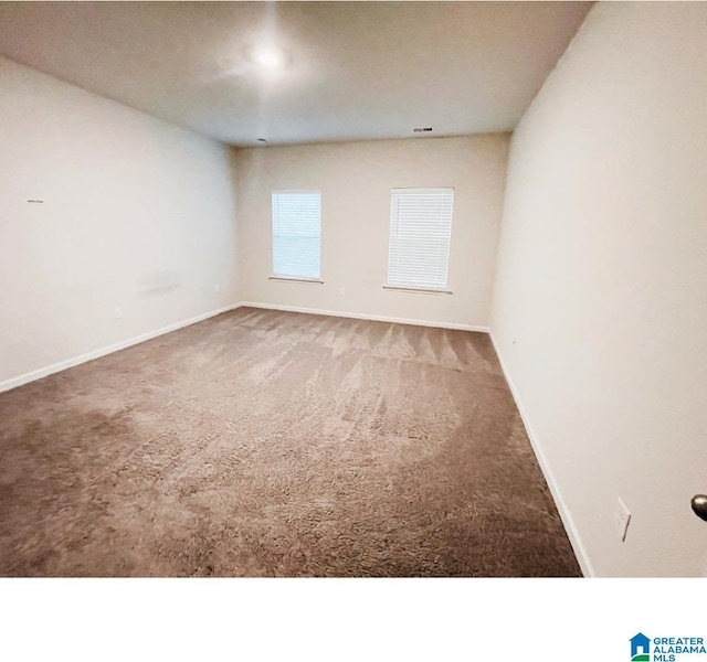 6936 Brandi Cir, Pinson, AL 35126 - spare room featuring carpet and baseboards