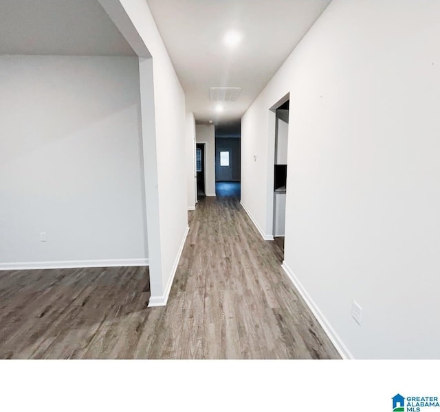 6936 Brandi Cir, Pinson, AL 35126 - hallway with wood finished floors and baseboards