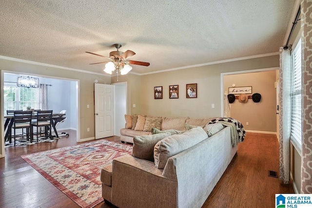 2089 Edenwood Cir, Hueytown, AL 35023 - living area featuring healthy amount of natural light, a textured ceiling, ceiling fan, ornamental molding, and wood finished floors