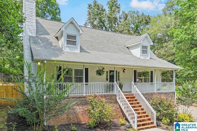 2089 Edenwood Cir, Hueytown, AL 35023 - cape cod house with a porch, a chimney, and stairs