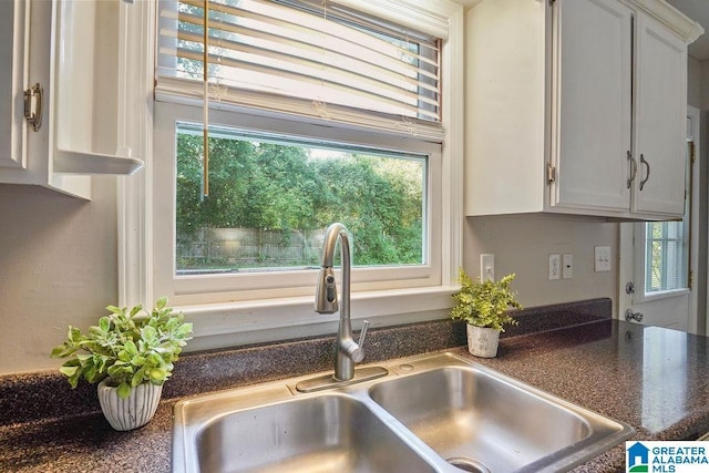 2089 Edenwood Cir, Hueytown, AL 35023 - kitchen view of dark countertops and white cabinetry