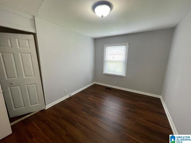 1637 17th St SW, Birmingham, AL 35211 - unfurnished room with wood finished floors and baseboards