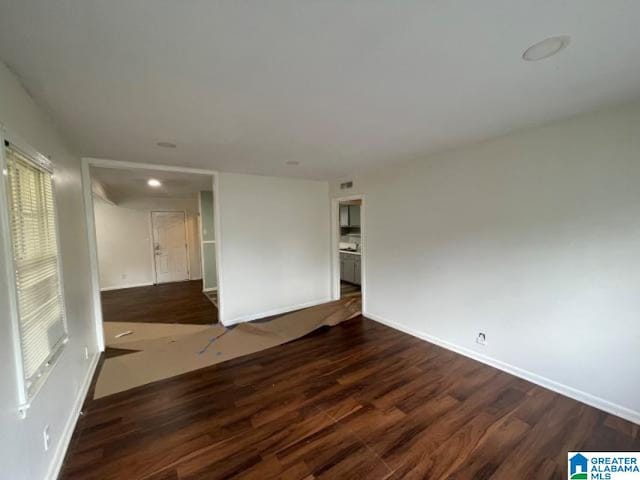 1637 17th St SW, Birmingham, AL 35211 - empty room featuring wood finished floors
