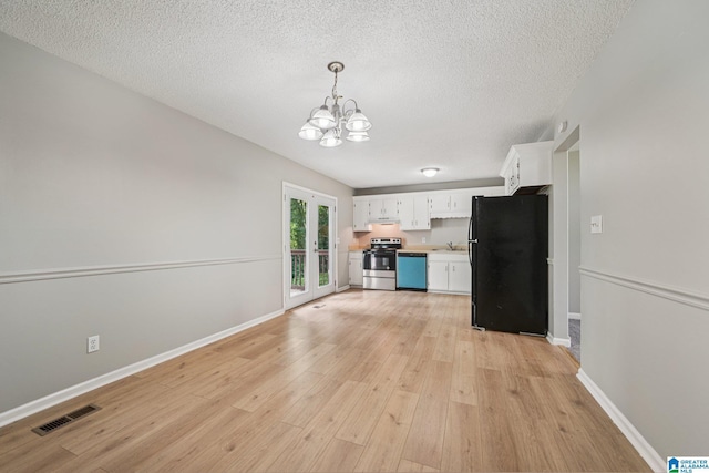5919 Creekwood Rd, Irondale, AL 35210 - kitchen with freestanding refrigerator, electric range, dishwasher, a chandelier, and white cabinets