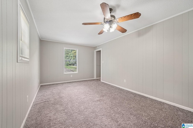 5919 Creekwood Rd, Irondale, AL 35210 - unfurnished room with carpet floors, ceiling fan, ornamental molding, and a textured ceiling