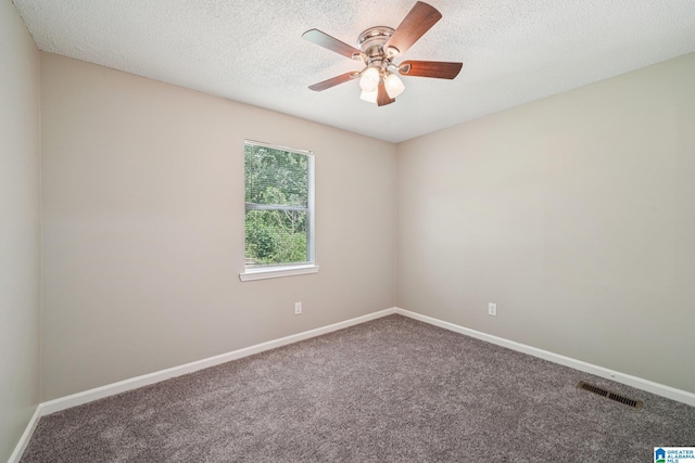 5919 Creekwood Rd, Irondale, AL 35210 - unfurnished room with carpet floors, a ceiling fan, and a textured ceiling
