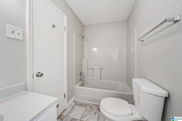 5919 Creekwood Rd, Irondale, AL 35210 - bathroom with marble look tiles,  shower combination, vanity, and a textured ceiling