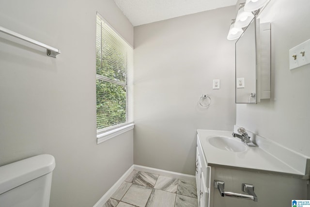 5919 Creekwood Rd, Irondale, AL 35210 - bathroom featuring vanity and marble look tile flooring