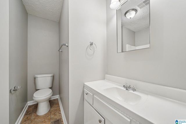 5919 Creekwood Rd, Irondale, AL 35210 - bathroom with a textured ceiling and vanity