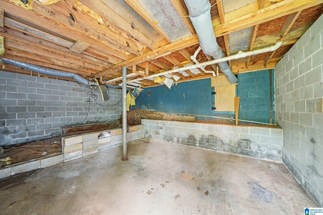 5919 Creekwood Rd, Irondale, AL 35210 - unfinished below grade area featuring concrete block wall