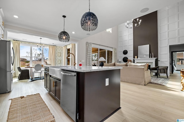 0222 Blackridge Cir, Hoover, AL 35244 - kitchen with a chandelier, stainless steel appliances, a kitchen island with sink, light stone countertops, and recessed lighting