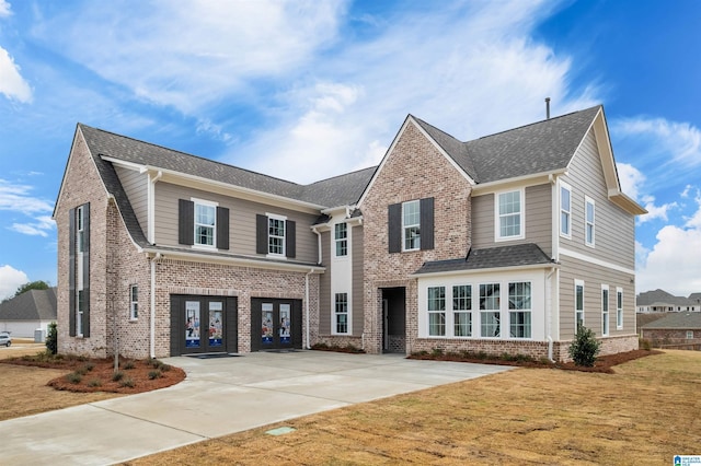 0222 Blackridge Cir, Hoover, AL 35244 - view of front of property featuring french doors, brick siding, and a front lawn