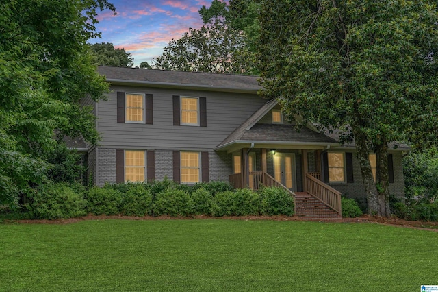 3764 Valley Head Rd, Mountain Brook, AL 35223 - view of front facade featuring a front lawn and brick siding