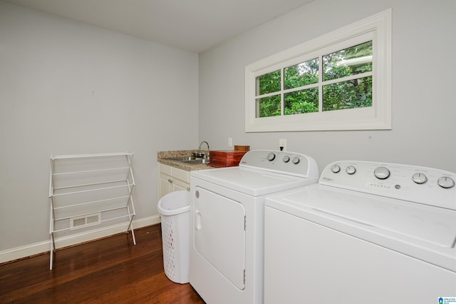 3764 Valley Head Rd, Mountain Brook, AL 35223 - laundry room with cabinet space, independent washer and dryer, and dark wood-style flooring