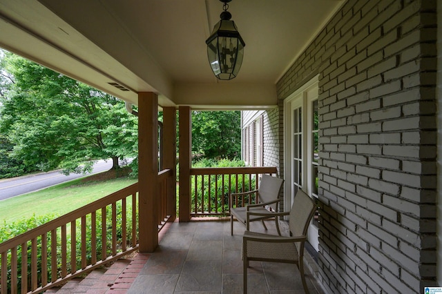 3764 Valley Head Rd, Mountain Brook, AL 35223 - wooden porch with a yard