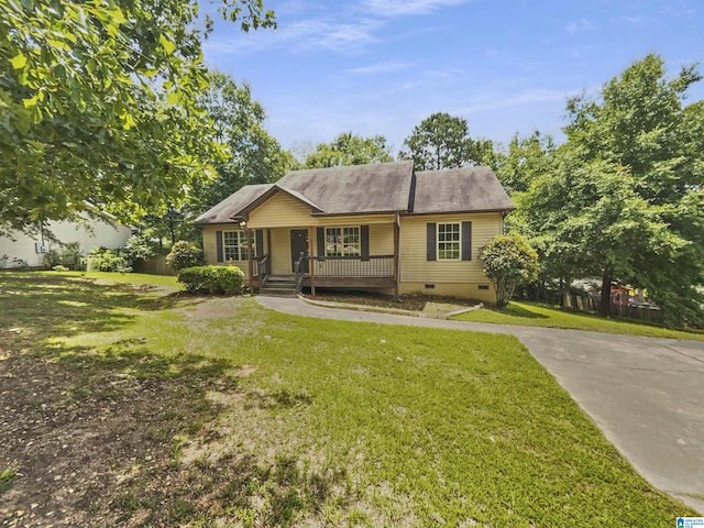 118 S Hill Dr, Wilsonville, AL 35186 - view of front of property with crawl space, a porch, a front yard, and roof with shingles