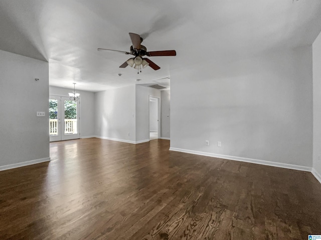 118 S Hill Dr, Wilsonville, AL 35186 - unfurnished living room featuring ceiling fan, dark wood-type flooring, and a chandelier