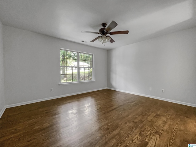 118 S Hill Dr, Wilsonville, AL 35186 - spare room with dark wood-style flooring and ceiling fan