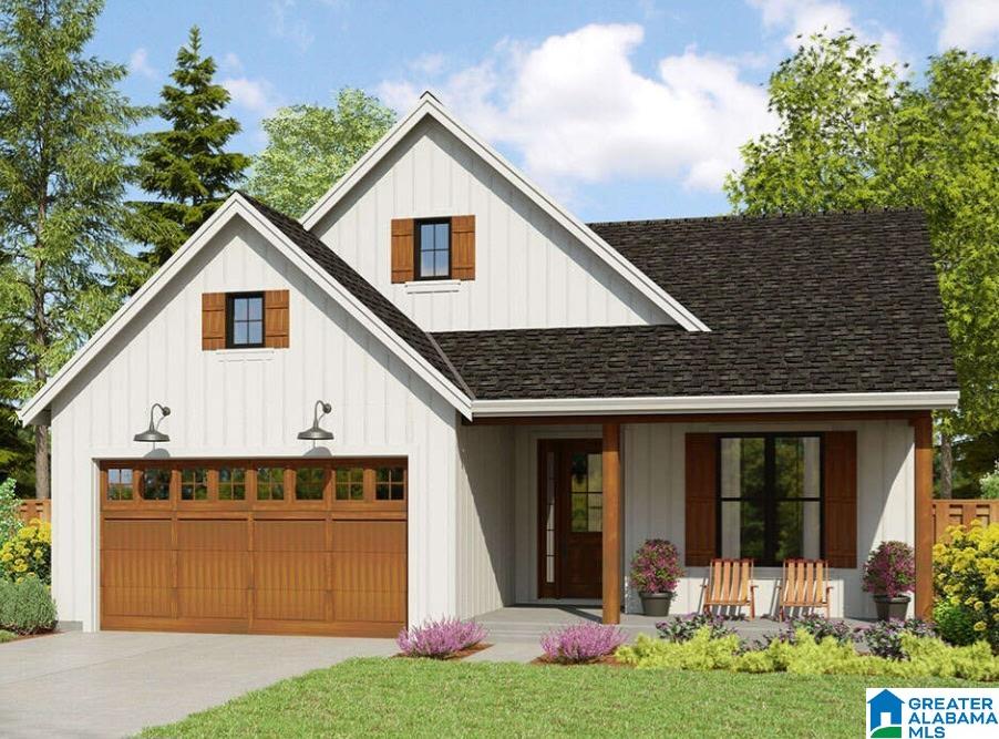 Alford Bend Rd, Hokes Bluff, AL 35905 - modern farmhouse featuring board and batten siding, covered porch, an attached garage, and concrete driveway