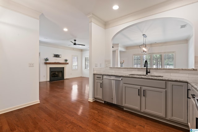 45183 Portobello Rd Unit 183, Birmingham, AL 35242 - kitchen with dishwasher, gray cabinetry, a fireplace with flush hearth, a ceiling fan, and backsplash