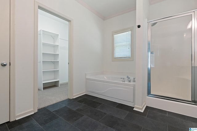 45183 Portobello Rd Unit 183, Birmingham, AL 35242 - bathroom featuring a stall shower, a garden tub, crown molding, and a spacious closet