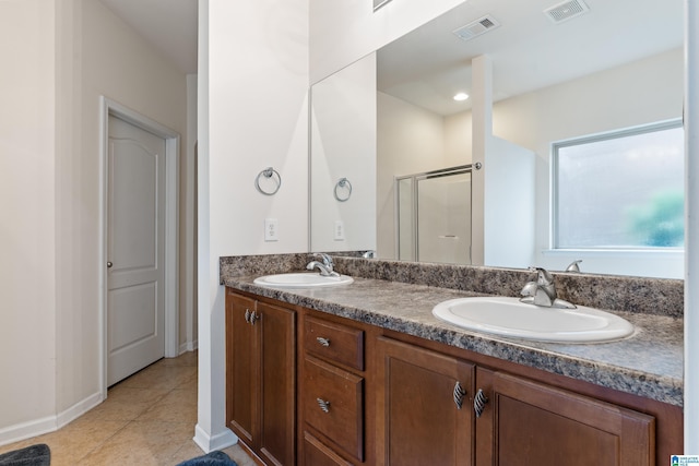 394 Glen Cross Way, Trussville, AL 35173 - full bath featuring a shower stall, double vanity, and tile patterned floors