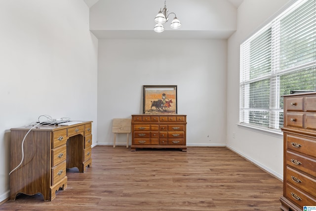 394 Glen Cross Way, Trussville, AL 35173 - office featuring lofted ceiling, a chandelier, and light wood finished floors