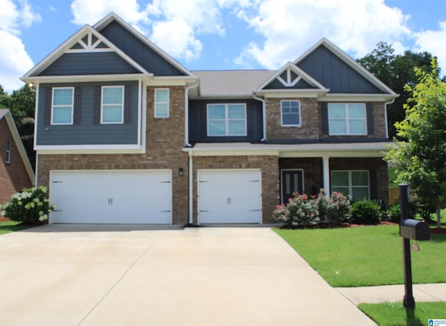 6284 Fieldbrook Cir, Mccalla, AL 35111 - craftsman house featuring a garage, a front yard, concrete driveway, board and batten siding, and brick siding