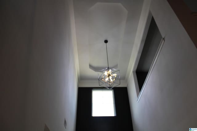 6284 Fieldbrook Cir, Mccalla, AL 35111 - detailed view of a chandelier and crown molding