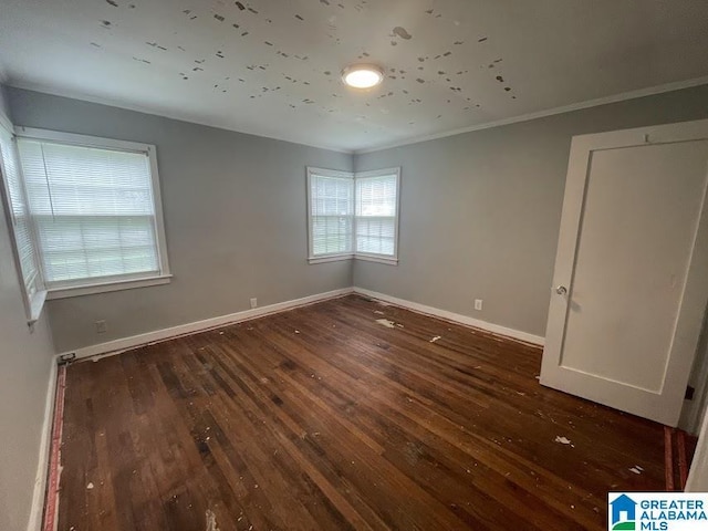 204 Gary Ave, Talladega, AL 35160 - spare room featuring wood-type flooring and ornamental molding