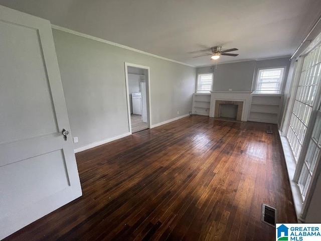 204 Gary Ave, Talladega, AL 35160 - unfurnished living room with ceiling fan, a tile fireplace, ornamental molding, and wood-type flooring