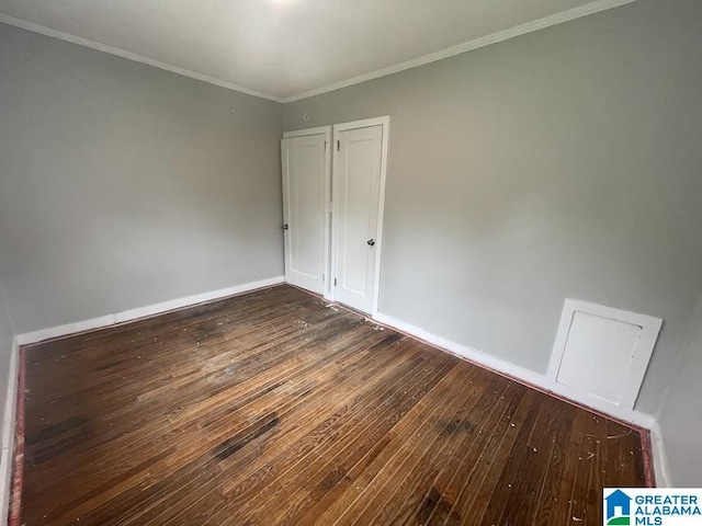 204 Gary Ave, Talladega, AL 35160 - empty room featuring hardwood / wood-style floors and ornamental molding