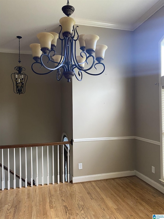 22917 Country Ridge Parkway, Mccalla, AL 35111 - detailed view of a chandelier, wood finished floors, and ornamental molding
