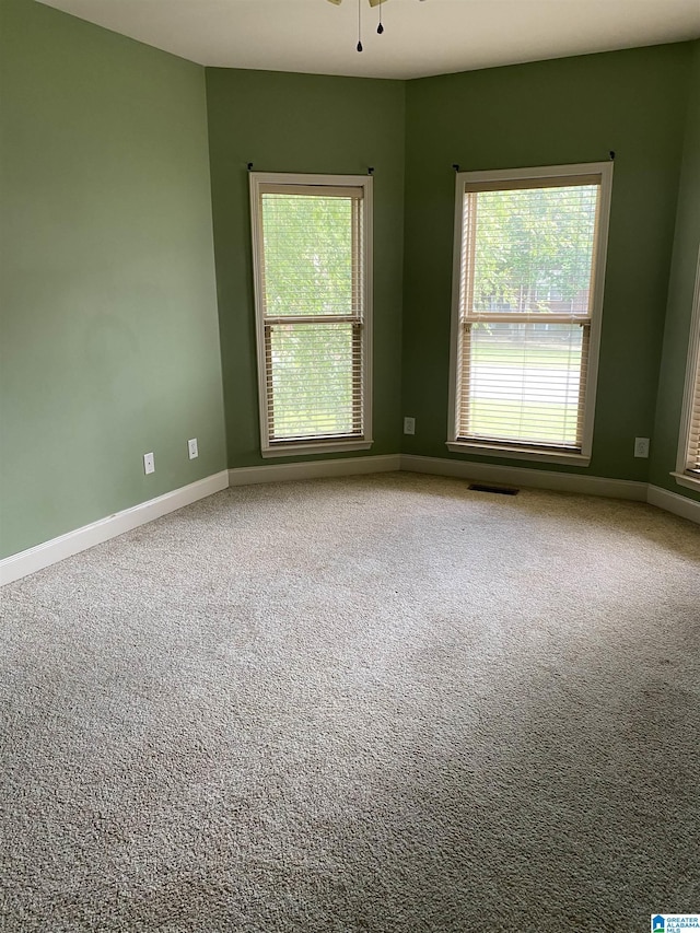 22917 Country Ridge Parkway, Mccalla, AL 35111 - carpeted spare room featuring baseboards and ceiling fan