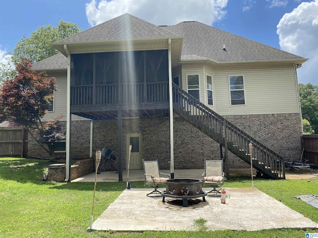 22917 Country Ridge Parkway, Mccalla, AL 35111 - back of house featuring a fire pit, a patio area, a sunroom, and stairway