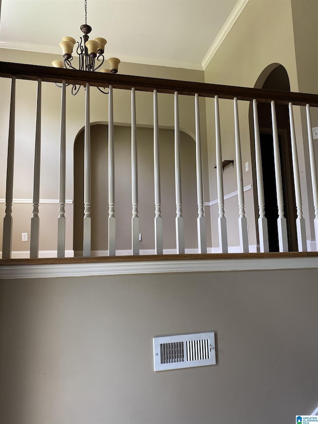 22917 Country Ridge Parkway, Mccalla, AL 35111 - stairway featuring a chandelier and ornamental molding