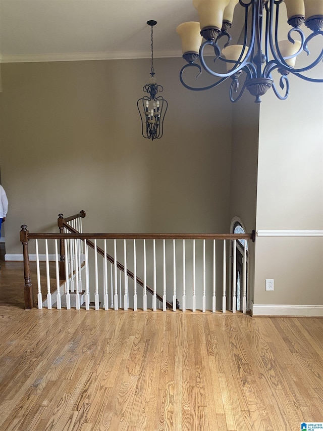22917 Country Ridge Parkway, Mccalla, AL 35111 - staircase featuring a chandelier, wood finished floors, and crown molding