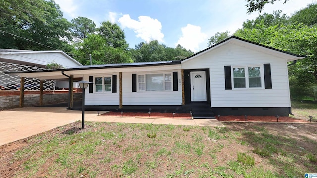 805 Jacksonville St, Weaver, AL 36277 - ranch-style home with crawl space, covered porch, and an attached carport