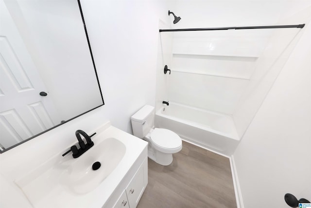 805 Jacksonville St, Weaver, AL 36277 - full bathroom featuring bathing tub / shower combination, vanity, and wood finished floors