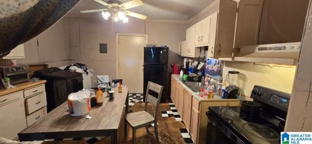308 Oregon St, Birmingham, AL 35224 - kitchen featuring black appliances, under cabinet range hood, ceiling fan, light countertops, and crown molding